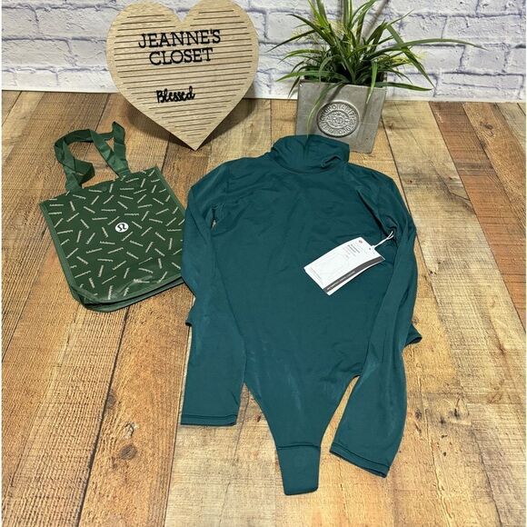 Lululemon Wundermost Ultra-Soft Nulu Turtleneck Bodysuit
Storm Teal - Picture 1 of 15